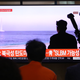 People watch a TV showing a file image of a North Korean missile launch at the Seoul Railway Station on October 02, 2019 in Seoul, South Korea.